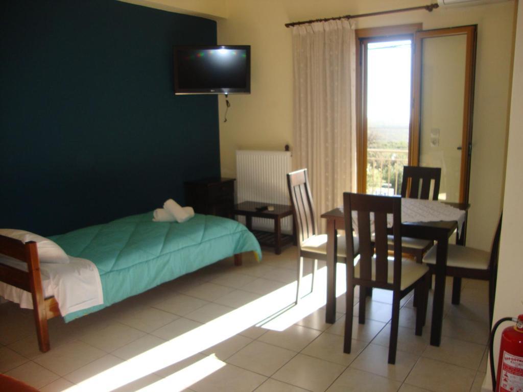 Kafiona Guesthouse Pírgos Dhiroú Pokoj fotografie